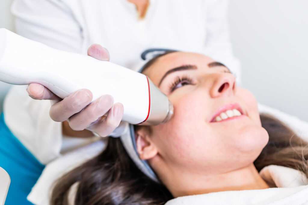 Person receiving RF Microneedling treatment.